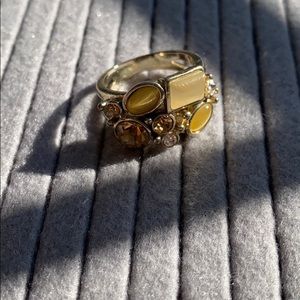 Gem and gold and yellow colour ring